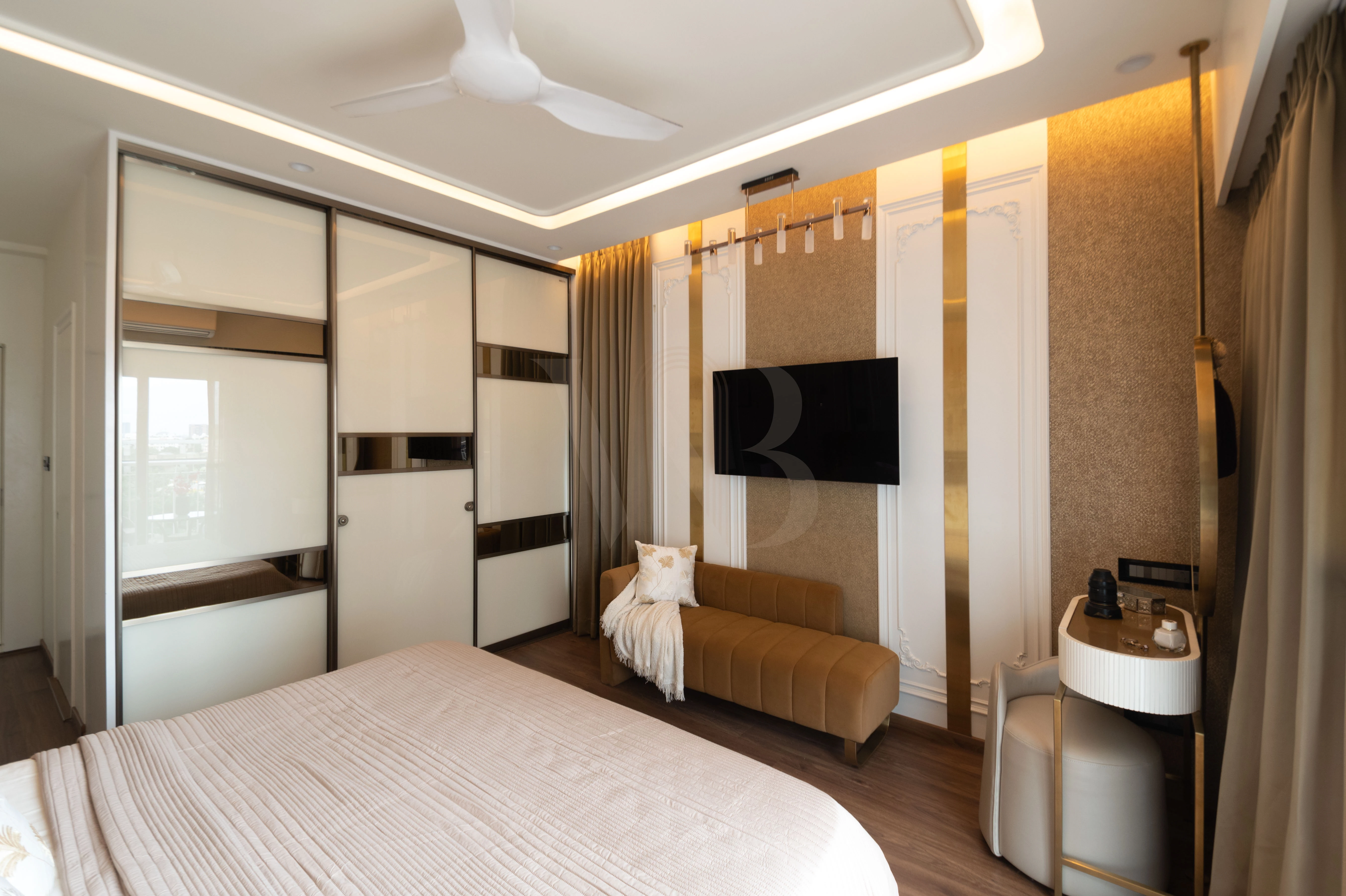 Sleek bedroom TV unit paneling